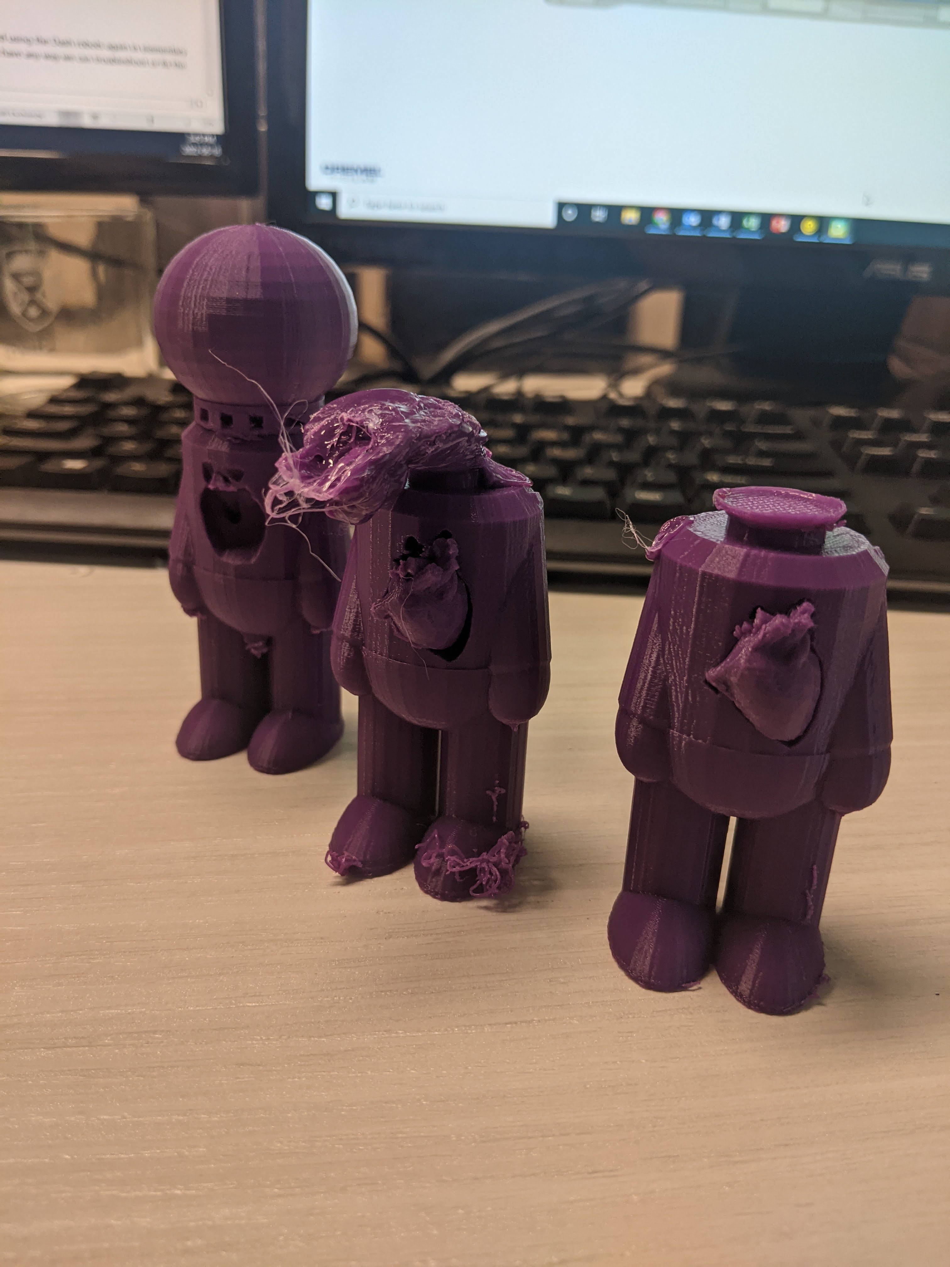 3D printed figurines with removable hearts were designed by Samantha to teach engineering applications.